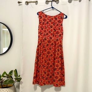 Red knee length dress with pockets. Women’s size small